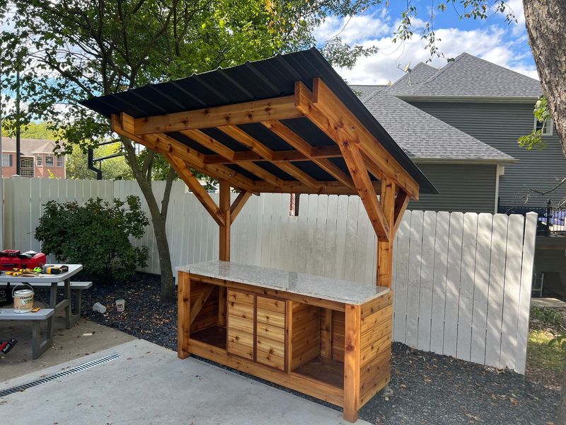 Cedar accent and standing seam metal canopy